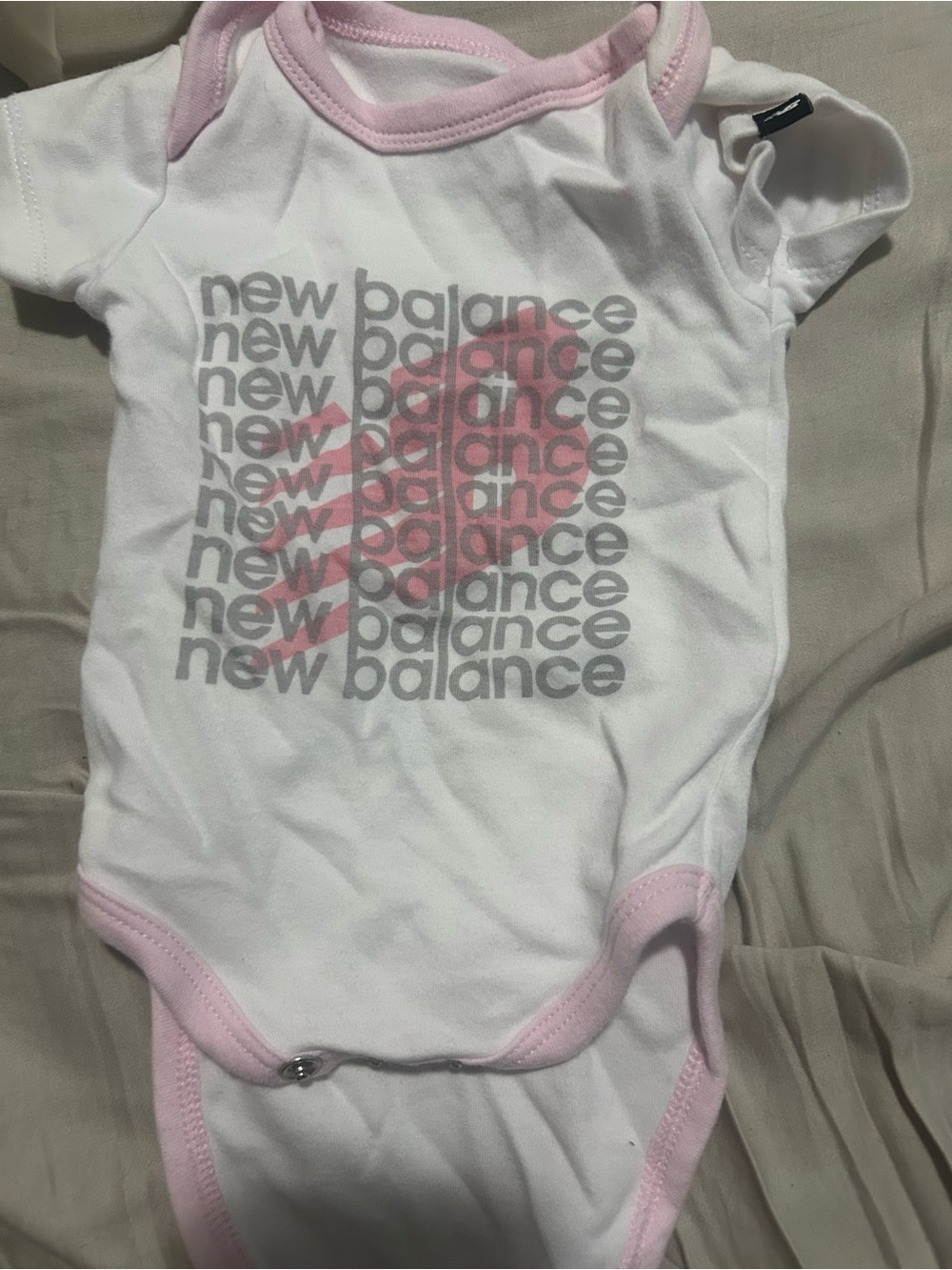 New Balance White One-Piece with Pink Trim & Gray Logo